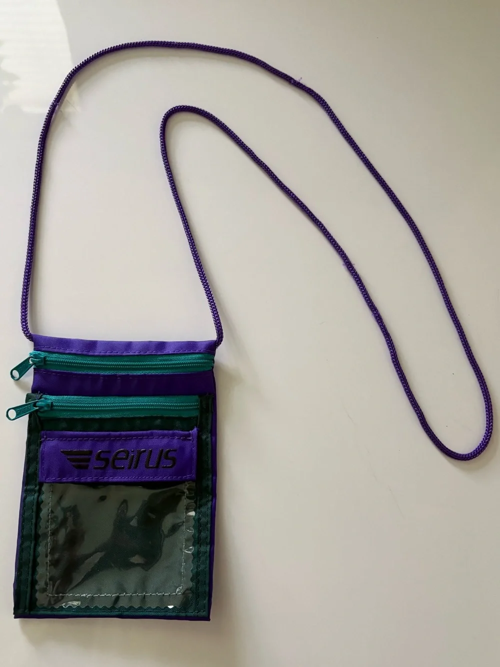 Seirus Purple and Teal Neck Pouch with Clear ID Window